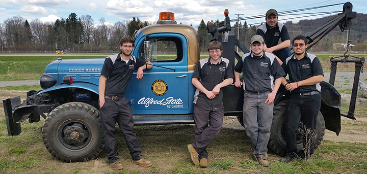 Alfred State students along with the 1953 Dodge Power Wagon they will use to compete in this year’s Great Race