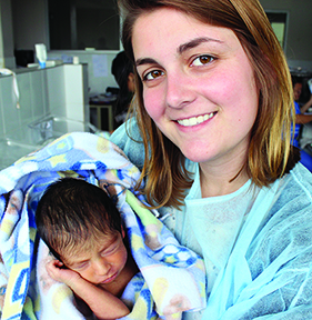 female student with newborn baby in Honduras