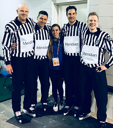 Cassidy, center, with some of the officials