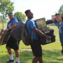 Students helping other students move in on campus.