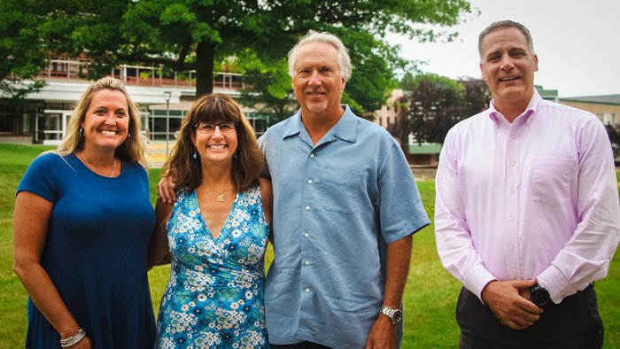 Russell and Brenda Herman pose with President Steve Mauro and Vice President of Institutional Advancement Danielle White when they returned to campus this summer.